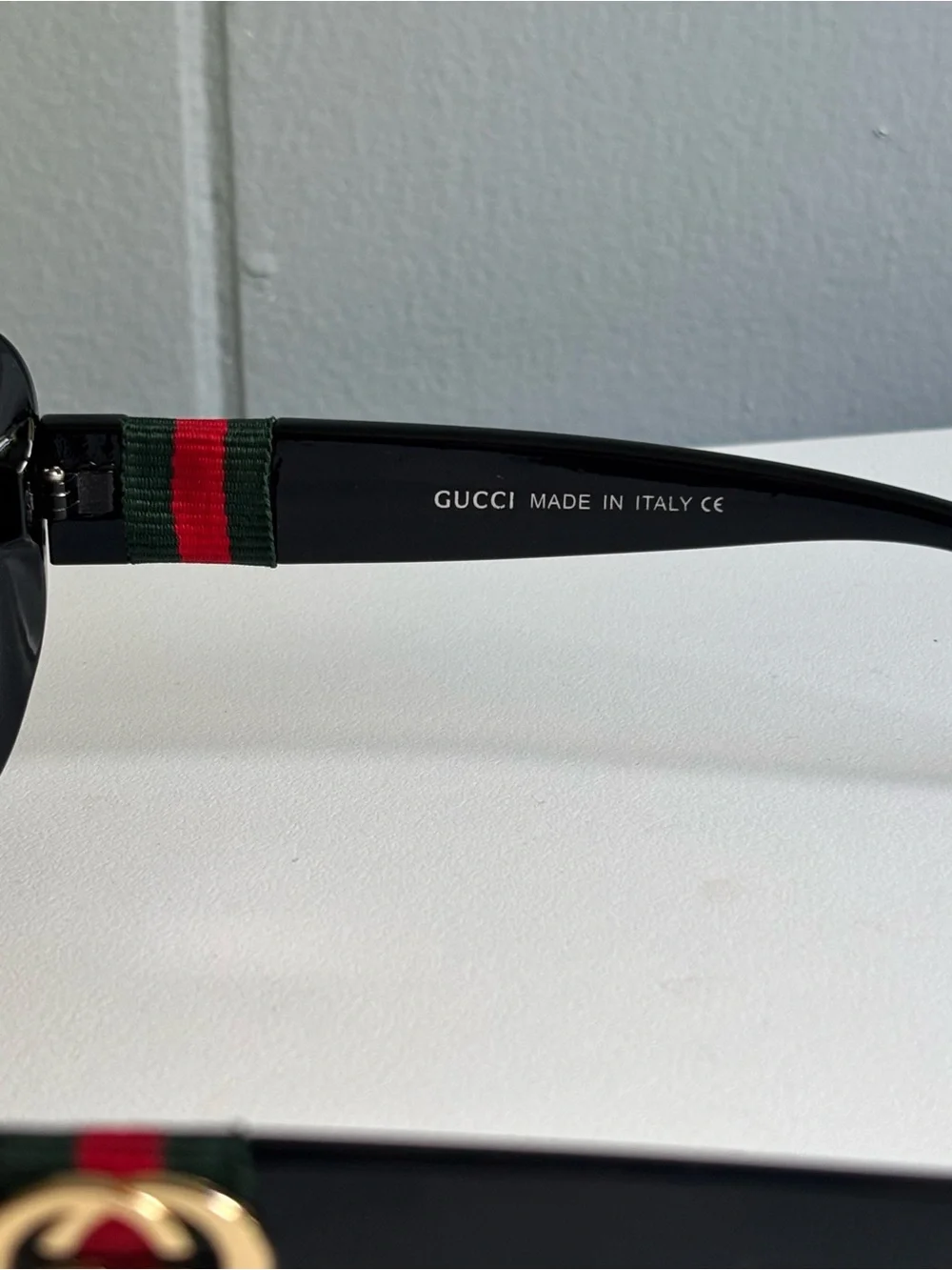Gucci Black Frame Sunglasses with Purple Gradient Lenses